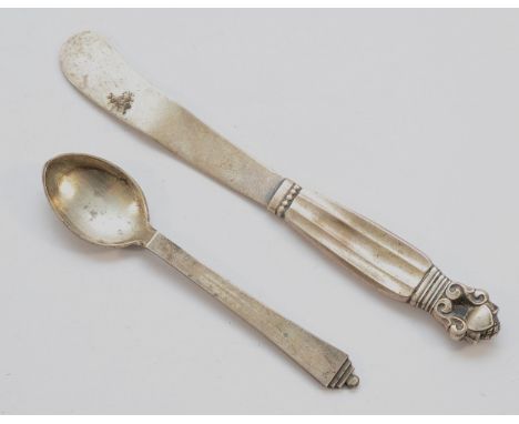 Georg Jenson, a Danish silver butter knife with Acorn decoration, together with another Georg Jenson silver coffee spoon with