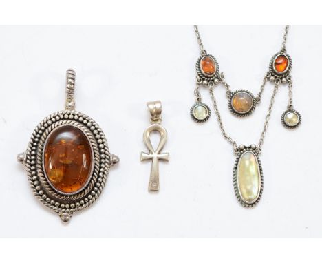 Suarti, a 925 silver and amber pendant, 45mm, an Egyptian silver cross pendant, 25mm, and an unmarked silver gemset necklace,
