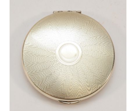 A silver KIGU compact, London 1966, having mirror but no powder, 6.5cm.