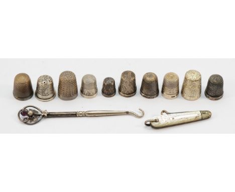 A silver thimble, Birmingham 1908, together with six other silver thimbles, three sterling silver thimbles, and two silver bu