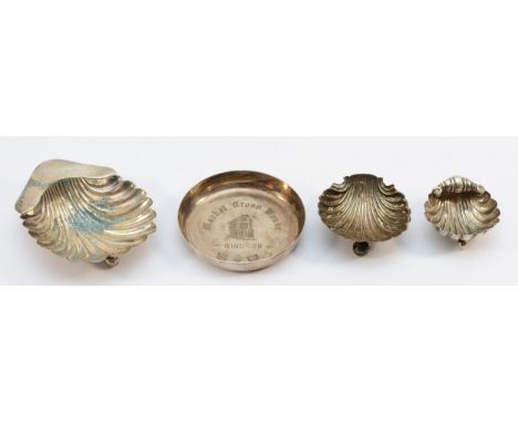 A silver trinket dish having market cross house engraves to the base, Birmingham 1970, together with a silver shell shaped di