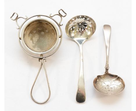 A silver sugar sifter, Sheffield 1925, together with a silver caddy spoon, Birmingham 1844, and a silver strainer, Birmingham