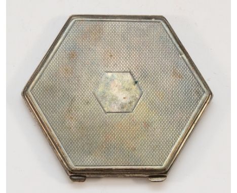 A silver hexagonal shaped compact, Birmingham 1933, with mirror but no powder, 8cm.