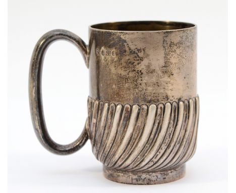 A silver embossed christening mug, Sheffield 1890, name and date embossed to the front, 8cm, 105gm.