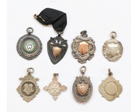 Eight various silver watch fobs, various dates, 63gm.