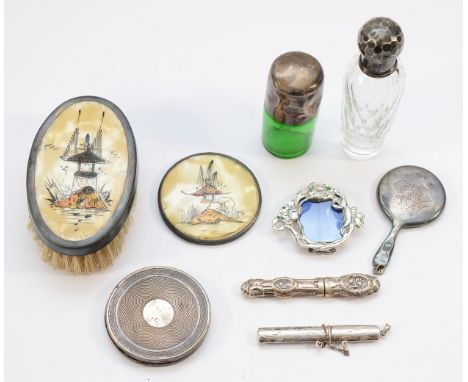 A silver and resin clothes brush and circular miniature mirror with oriental scene painted to the back, Birmingham 1927,1931,