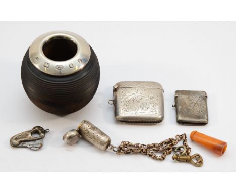 Two silver vesta cases, Birmingham 1919, 1902, together with a silver cheroot case Birmingham 1911, a silver cigar cutter, Bi