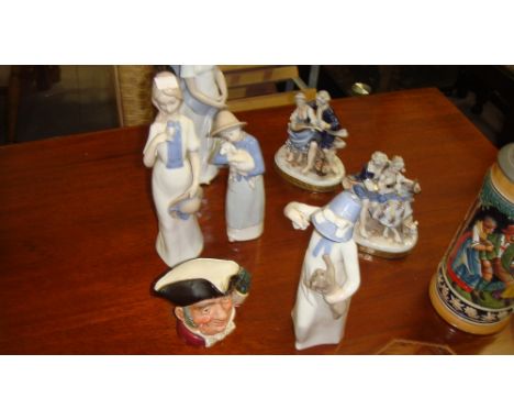 Assorted figurines including Nao figure, Doulton character jug, etc.
