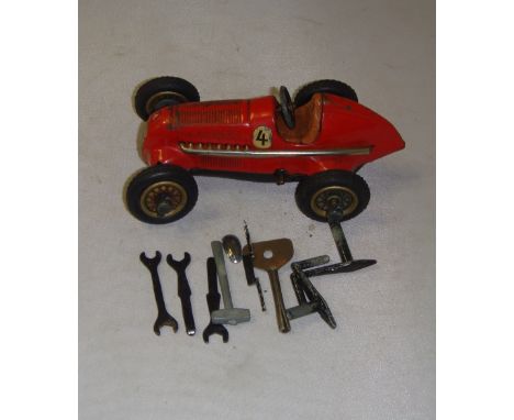 Vintage Shuco Studio clockwork tin plate racing car with key and tools (condition fair - good but worn in places)