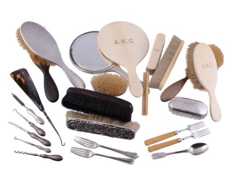  A small collection of silver and other items,   including: five silver mounted dressing table items; five silver mounted man