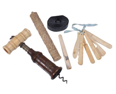  A King's type patent corkscrew,   mid 19th century, with a turned bone handle; a Chinese carved ivory bodkin case, mid-late 