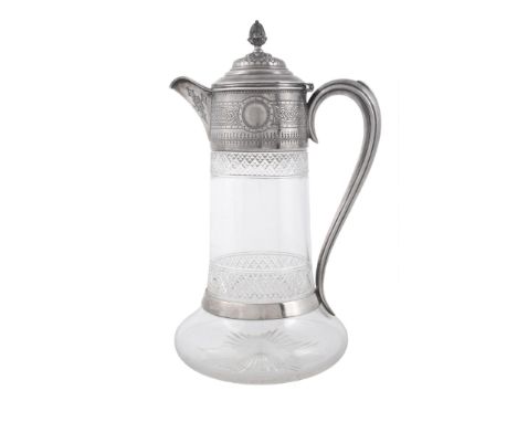  A Victorian silver mounted cut glass claret jug by Horace Woodward  &  Co.,   London 1879, with a cone finial to the embosse