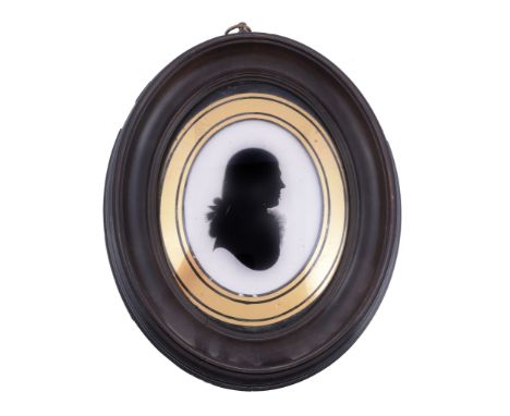  Attributed to John Miers Silhouette portrait of a gentleman to the right Painted on plaster 8.7cm (3 1/2in) high, oval In a 