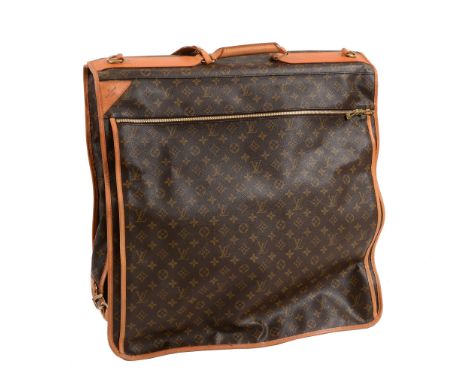  Louis Vuitton, a large brown canvas and leather suitcarrier/suitcase,   with all over logo print, fitted with a suspension h