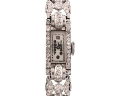  A lady's diamond cocktail watch,   circa 1940, Swiss manual wind movement, 15 jewels, silvered dial, applied Arabic numerals