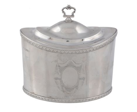  A silver navette shape tea caddy in George III style by George Nathan  &  Ridley Hayes,   Chester 1907, with a shaped loop h