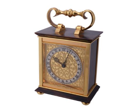  Hausmann  &  Co., a brass and lacquer table clock,   alarm movement, silvered Roman numeral chapter ring, the dial with scro