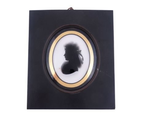  John Miers (British, circa 1758-1821) Silhouette portrait of a lady to the left Painted on plaster 8.7cm (3 1/2in) high, ova