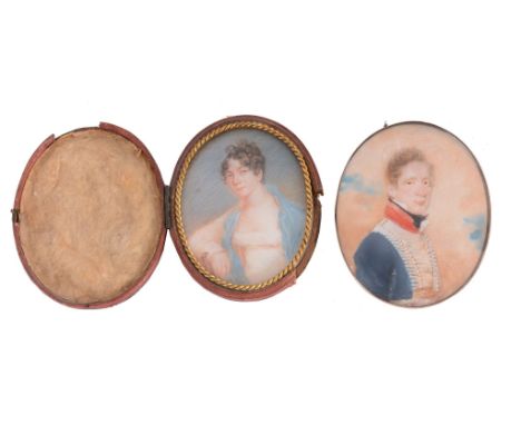  English school (early 19th century),   portrait of a young officer of Hussars?, 8.6cm x 7cm , oval, in a gilt metal plain fr