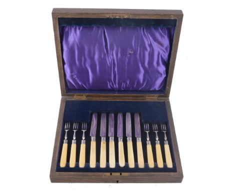  A set of six silver ivory handled fruit knives and forks by Harrison Brothers  &  Howson,   Sheffield 1937, in an oak case 