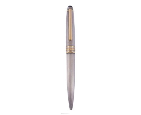  Montblanc, Meisterstuck, a silver coloured ballpoint pen,   with engine turned decoration, gilt clip and cap bands, stamped 