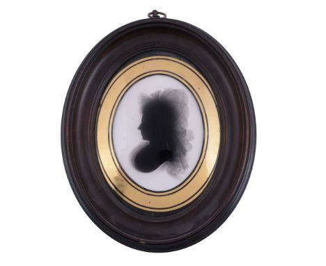  Attributed to John Miers Silhouette portrait of a lady to the left Painted on plaster 8.7cm (3 1/2in) high, oval In a pearwo