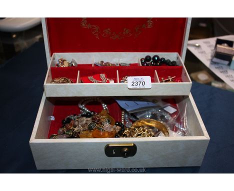 A Jewellery Box and contents including costume necklaces, brooches, ear-rings, cufflinks and tie pins, yellow metal bangle an