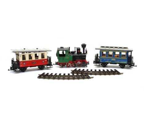 A Lehmann-Gross-Bahn G scale railway: model 2020 locomotive with driver, 2 x 3030 LGB - Personenwagens and a passenger and 1 