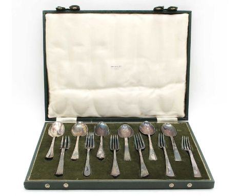 Three silver-plated cased cutlery sets, one Art Nouveau design, 12 spoons, a toasting fork, a butter knife and a pair of spoo