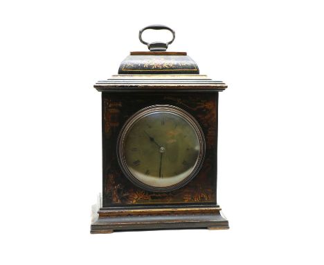 A 1920's black lacquered and chinoiserie mantel clock, the French drum movement with convex brass dial. 23cm high to top of b