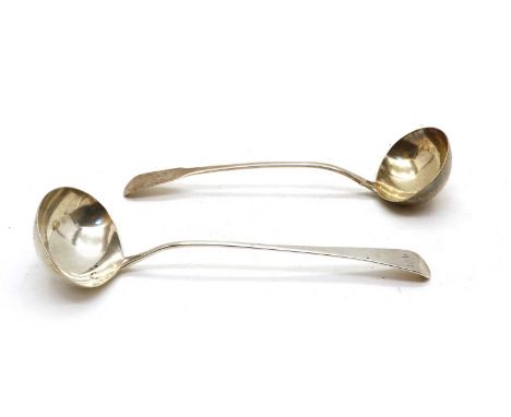 A George III silver fiddle pattern soup ladle, London 1822, makers Eley, Fearn and Chawner and an old english pattern ladle b