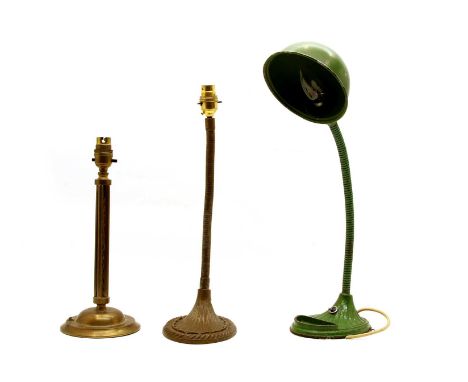 A green painted mid-century table lamp, having shell form base and adjustable arm, together with a similar example and one ot