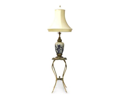 A late 19th century Japonais style gilt metal and pottery lamp, converted from and oil lamp complete with ivory silk shade an