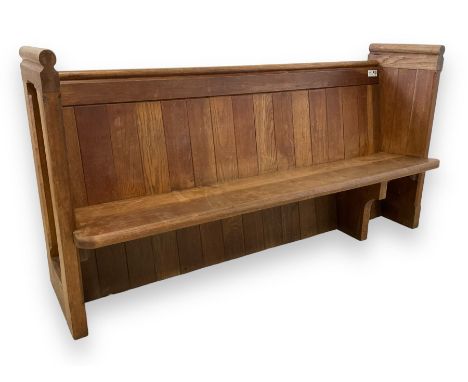 19th century oak church pew or hall bench, moulded cresting rail over panelled back and plank seat, on panelled end supports 