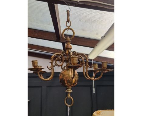 A Dutch style brass six branch chandelier, 50cm high.