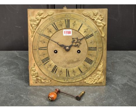 An 18th century 11 1/2in brass eight day longcase clock dial and movement, the chapter ring inscribed 'Abrm Jaques'.