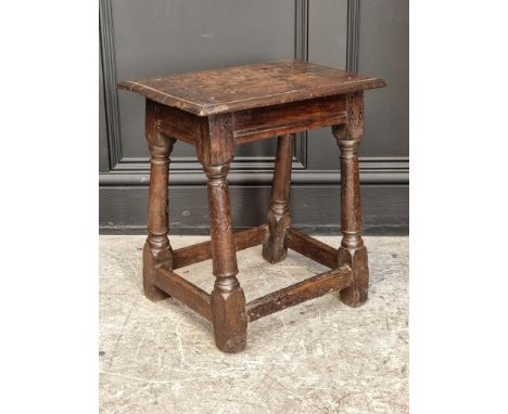 A late 17th century oak joint stool, 49cm high x 46cm wide.