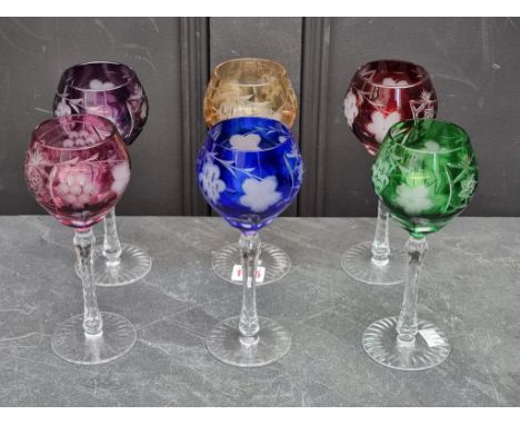 A set of six cut and coloured glass goblets, 20.5cm high.