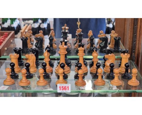 A good Jaques boxwood and ebonized chess set, weighted, king 8.3cm, pawn 4cm, in associated box.