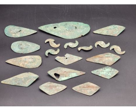 Antiquities: a collection of Chinese Archaic verdigris bronze items, probably Han Dynasty, largest 12.5cm long. (18)