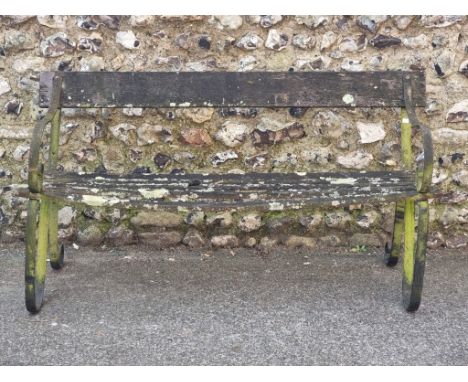 A wrought iron garden bench, 150.5cm wide.