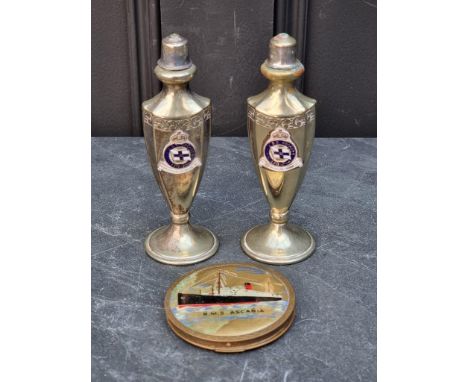 Of Maritime Interest: a pair of SS Orcades electroplated pepperettes, 14cm high; together with an RMS Ascania compact. (3)