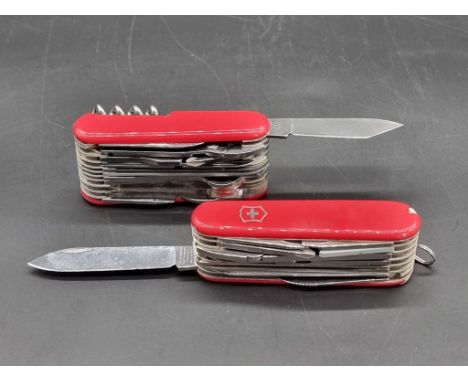Two Swiss Army knives. 