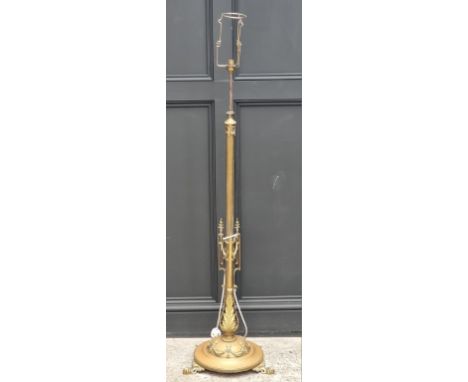 A brass adjustable standard lamp. 