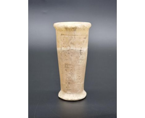 Antiquities: an Egyptian alabaster jar, probably Middle/New Kingdom, inscribed with hieroglyphs, 12.5cm high.