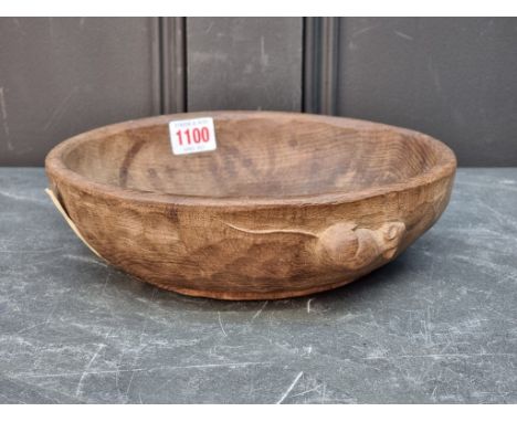 A Robert 'Mouseman' Thompson oak nut bowl, 24cm diameter, (split).