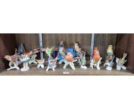 Eighteen Goebel birds. 