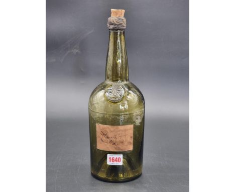 A rare 1811 'Year of the Comet' sealed magnum Cognac bottle, height excluding cork stopper 32.5cm.