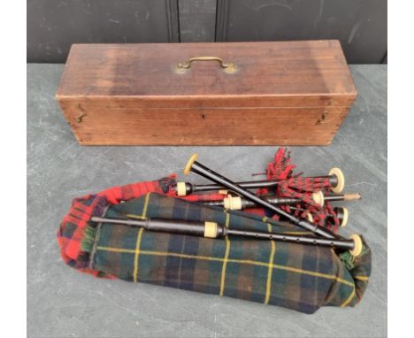 A set of antique ebony and ivory mounted bagpipes, inscribed 'Alexr Glen, Edinr', and 'Dn McDougall, Breadalbane', in mahogan