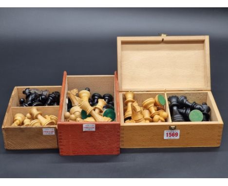 Three Staunton pattern chess sets, one with associated black knight.